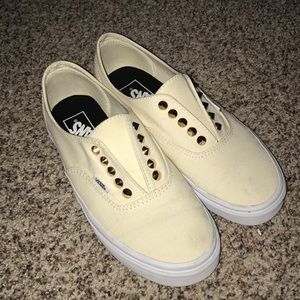 gold and cream studded slip on vans!